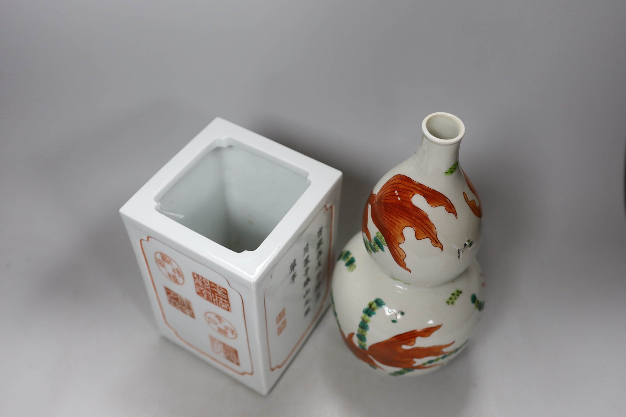 A Chinese iron red and black inscribed square brushpot and a goldfish double gourd vase (a.f.) tallest 29cm